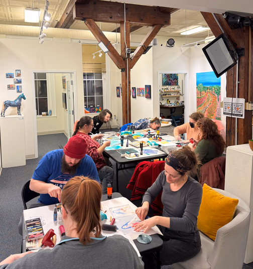 Art workshop in progress at Mosaic Art Collective with community members creating together