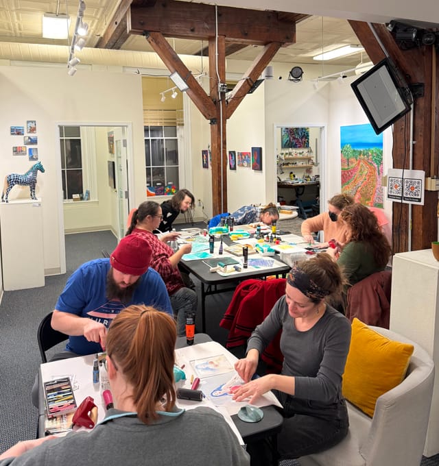Art workshop in progress at Mosaic Art Collective with community members creating together