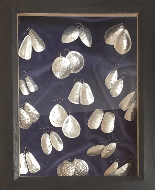 Hand-forged Earrings in Display Case