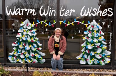 Warm Winter Wishes window painted at the DoubleTree by Hilton