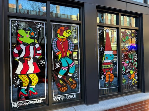 Holiday characters painted on the Fishtoes storefront windows